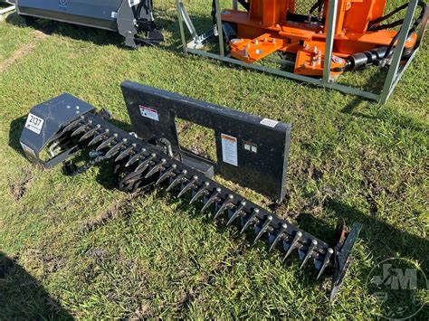 wolverine skid steer rock picker|wolverine attachments for sale.